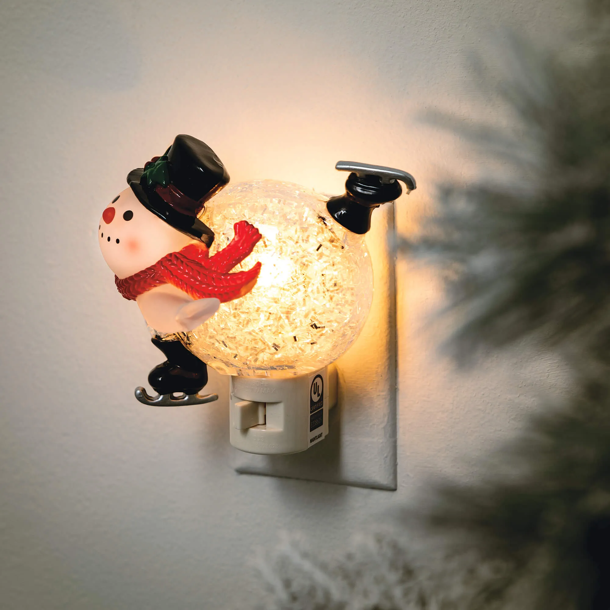 5"H Sullivans Ice Skating Snowman Nightlight, Multicolored