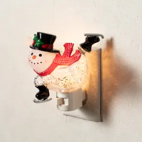 5"H Sullivans Ice Skating Snowman Nightlight, Multicolored