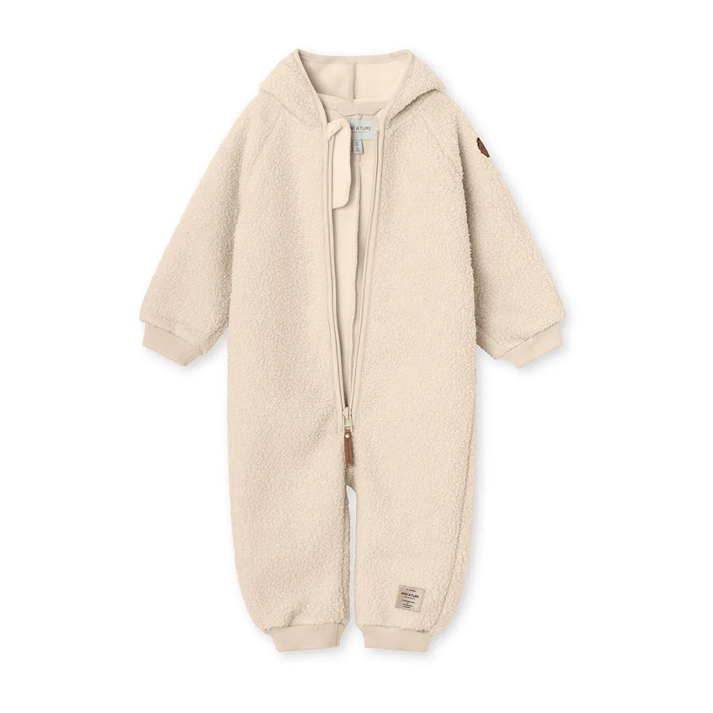 Adel Teddyfleece Jumpsuit. GRS Sand Dollar